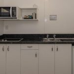 spacious kitchen area in the motel
